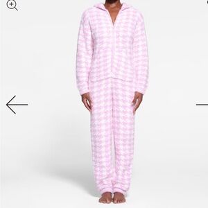 SKIMS Pink and White Pajama Set